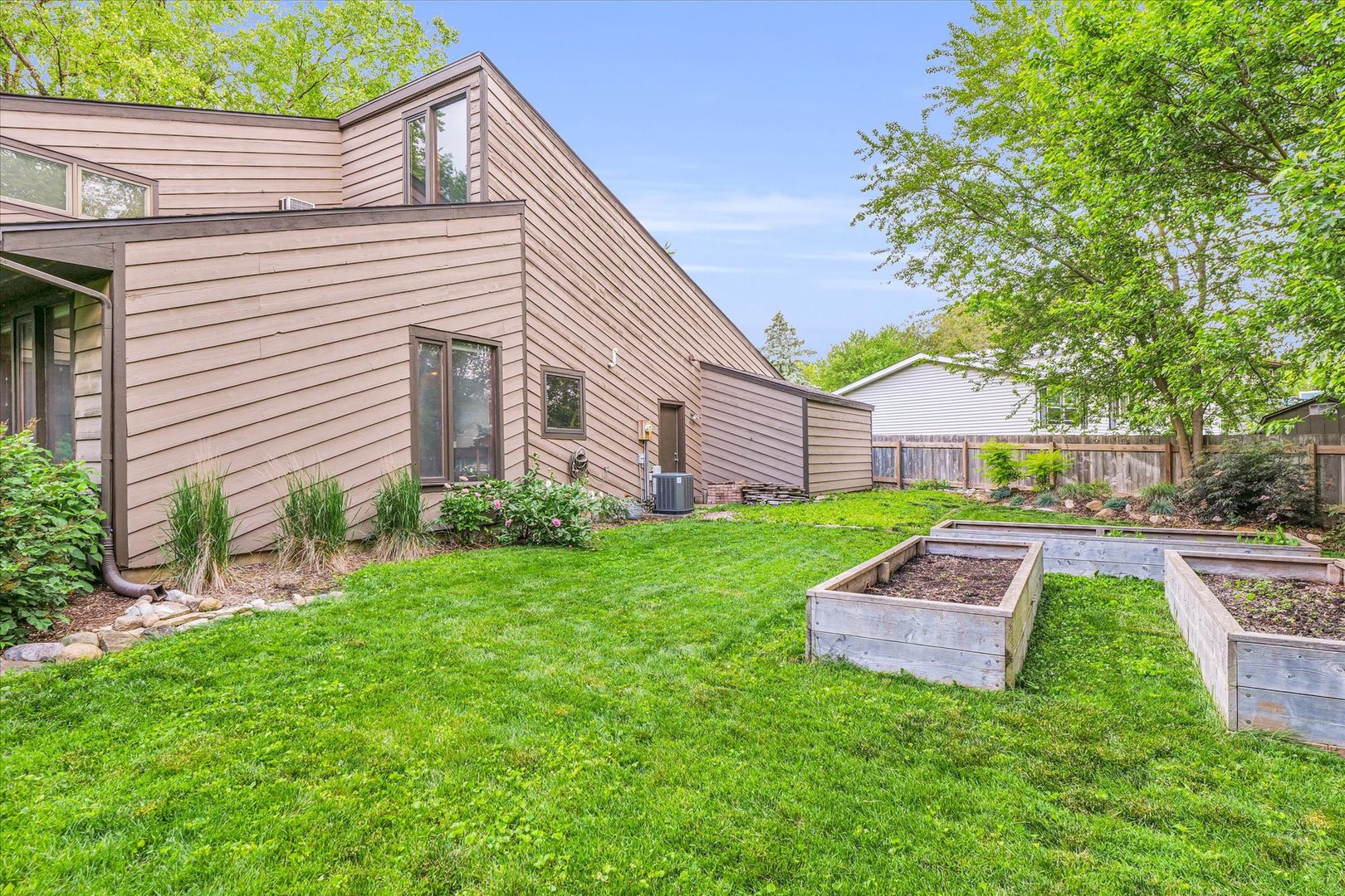 1910 Stratford Court Champaign, IL 61821 - Photo 38 of 39 a view of a house with a yard and furniture