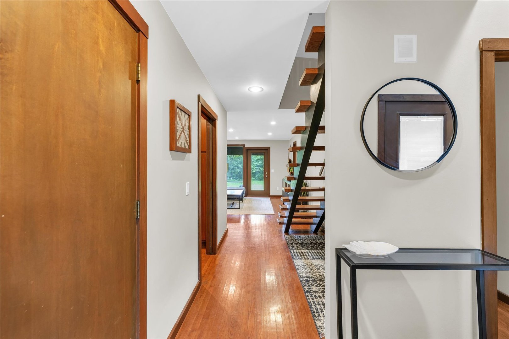 1910 Stratford Court Champaign, IL 61821 - Photo 4 of 39 a view of a entryway of a house with wooden floor
