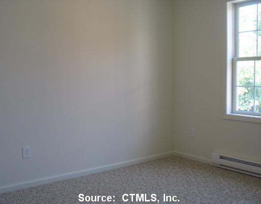 7 New Street, Unit 202 Danbury, CT 06810 - Photo 4 of 10 an empty room with a window