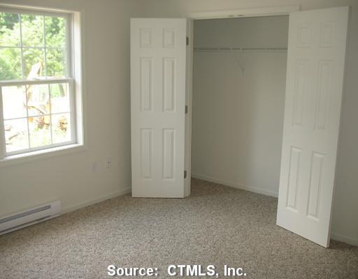 7 New Street, Unit 202 Danbury, CT 06810 - Photo 5 of 10 an empty room with windows