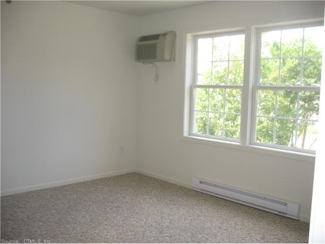 7 New Street, Unit 202 Danbury, CT 06810 - Photo 6 of 10 an empty room with a window