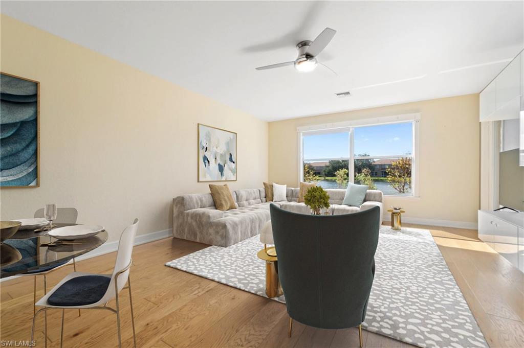 17560 Cherry Ridge Lane Fort Myers, FL 33967 - Photo 11 of 30 a living room with furniture and a large window
