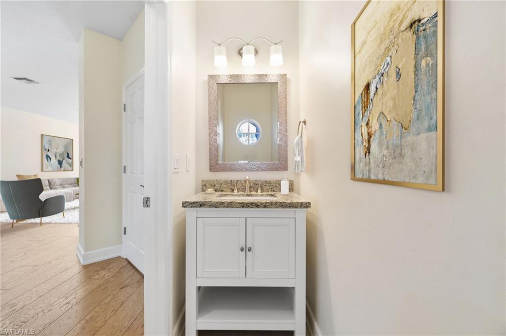 17560 Cherry Ridge Lane Fort Myers, FL 33967 - Photo 14 of 30 a view of bathroom with a sink mirror and bathtub