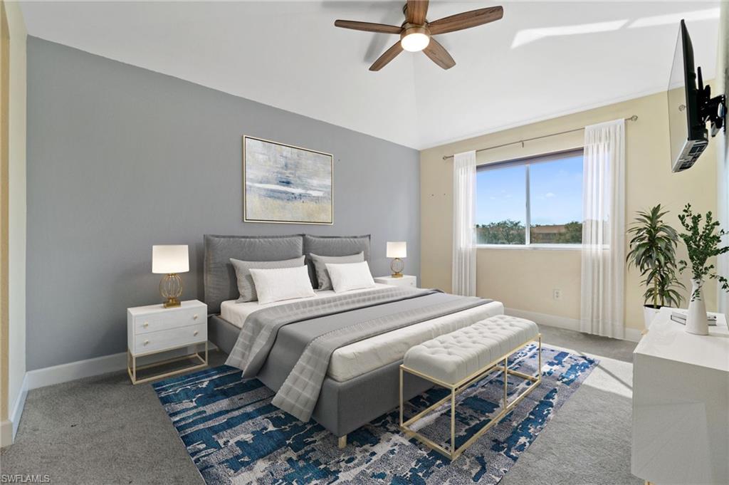17560 Cherry Ridge Lane Fort Myers, FL 33967 - Photo 16 of 30 a bedroom with a bed and a chandelier