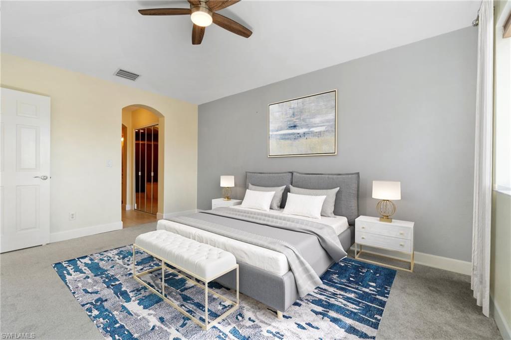 17560 Cherry Ridge Lane Fort Myers, FL 33967 - Photo 17 of 30 a bedroom with a bed and wooden floor