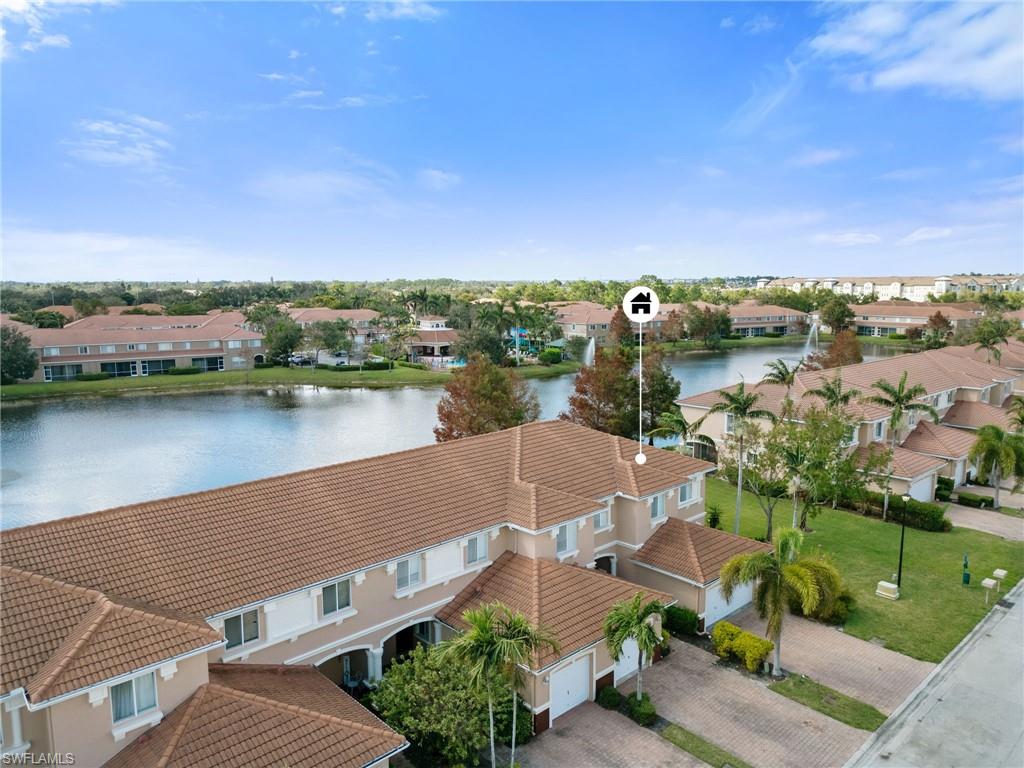 17560 Cherry Ridge Lane Fort Myers, FL 33967 - Photo 2 of 30 an aerial view of a house with a lake view