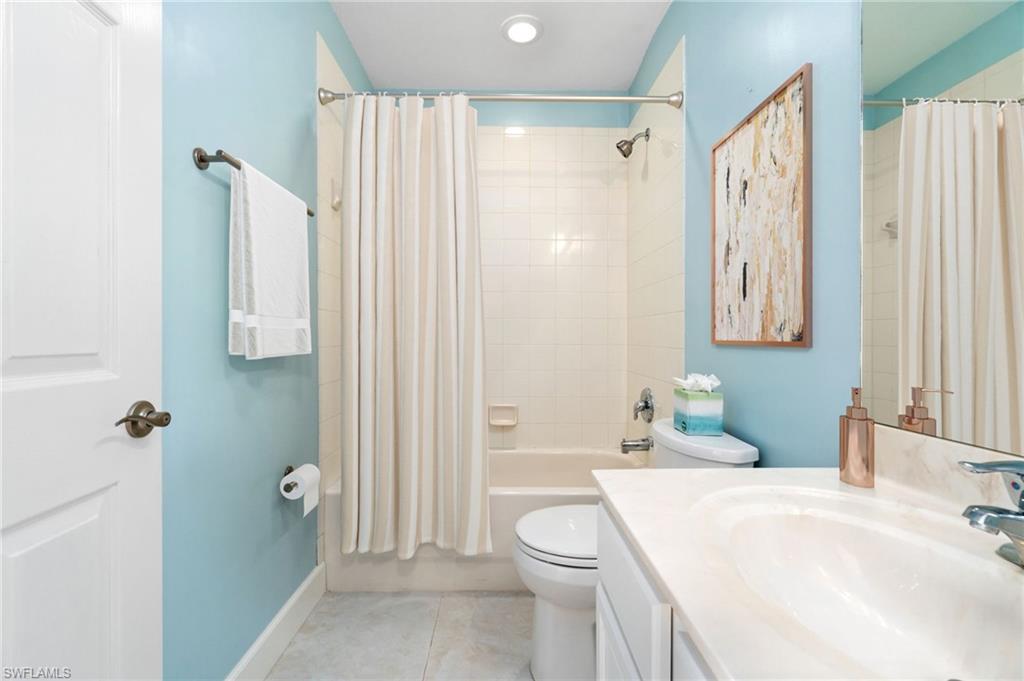 17560 Cherry Ridge Lane Fort Myers, FL 33967 - Photo 22 of 30 a bathroom with a sink a toilet and shower