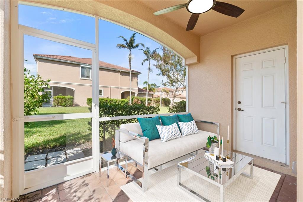 17560 Cherry Ridge Lane Fort Myers, FL 33967 - Photo 26 of 30 a living room with furniture and a yard