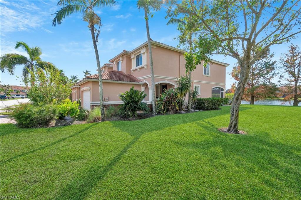 17560 Cherry Ridge Lane Fort Myers, FL 33967 - Photo 4 of 30 a view of a house with a yard