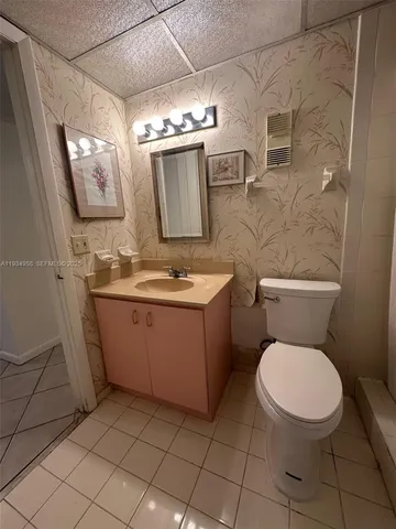 a bathroom with a sink and a toilet