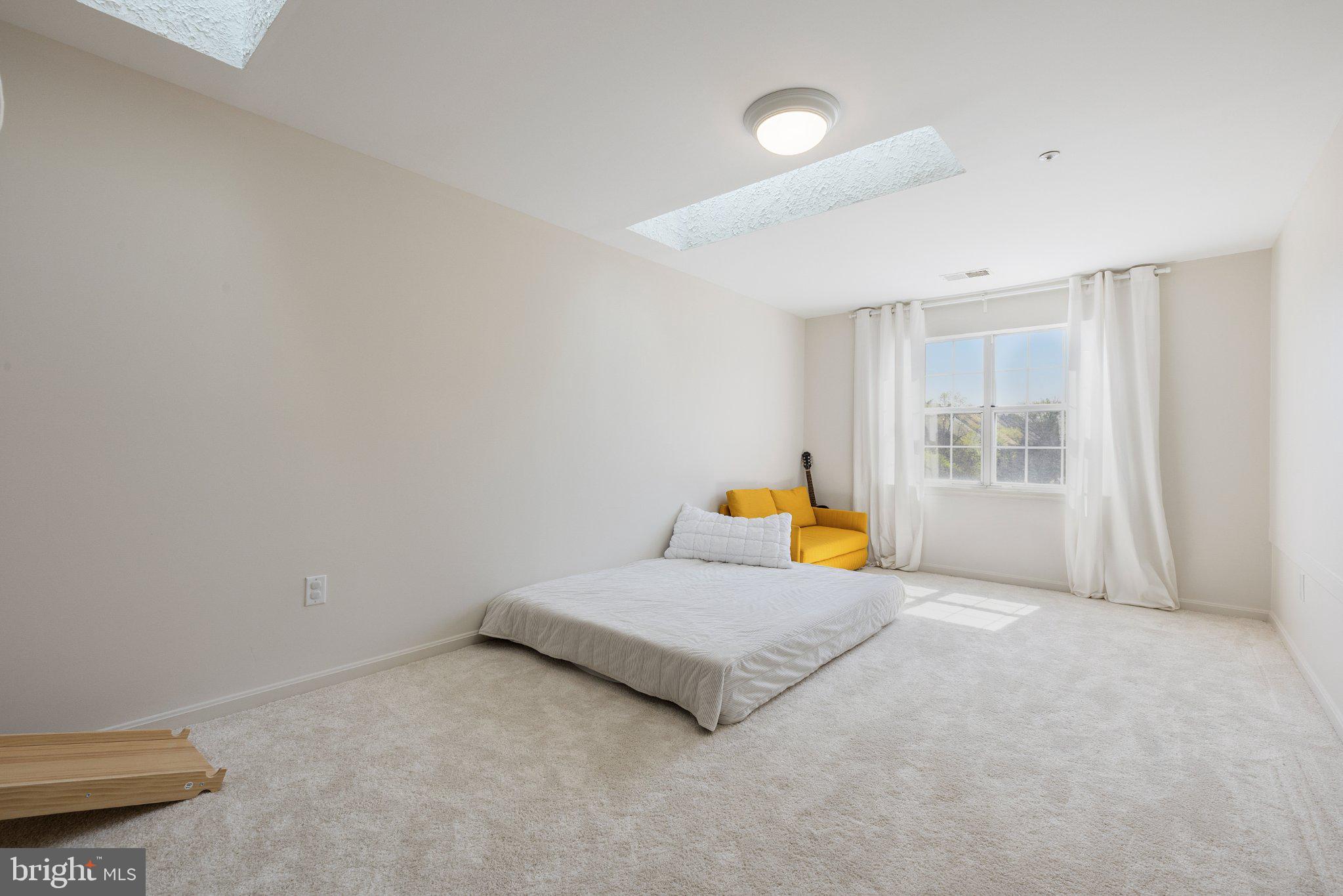 408 Ridgepoint Place, Unit 40838 Gaithersburg, MD 20878 - Photo 27 of 28 Bright and airy minimalist retreat.