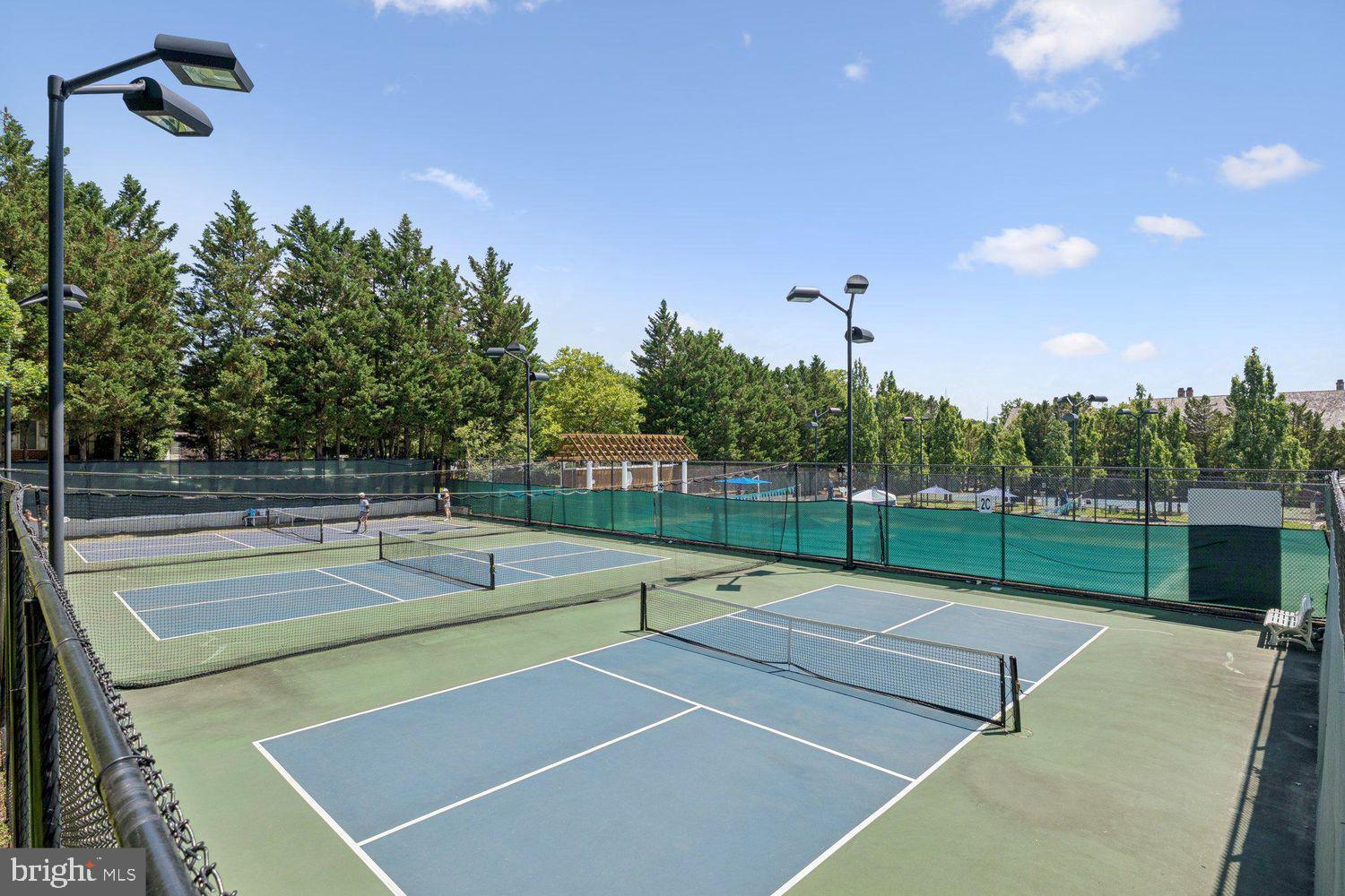 408 Ridgepoint Place, Unit 40838 Gaithersburg, MD 20878 - Photo 32 of 38 a view of a tennis court