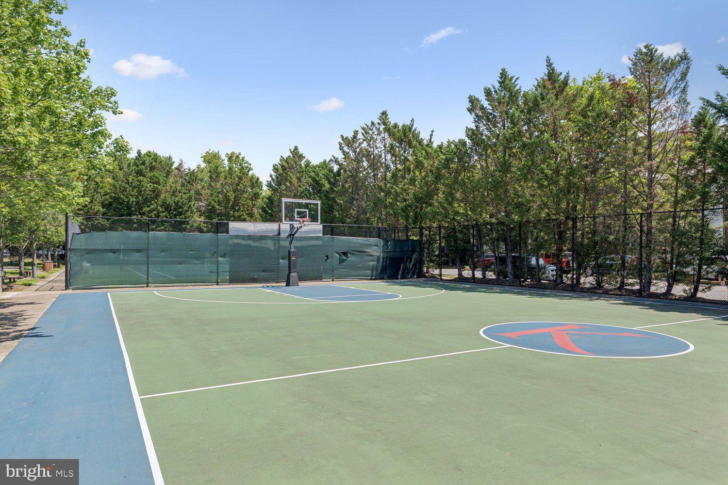 408 Ridgepoint Place, Unit 40838 Gaithersburg, MD 20878 - Photo 33 of 38 a view of a tennis court