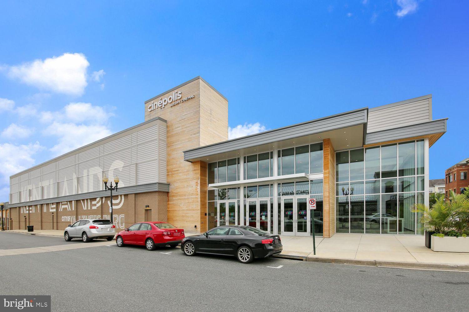408 Ridgepoint Place, Unit 40838 Gaithersburg, MD 20878 - Photo 36 of 38 a car parked in front of a building