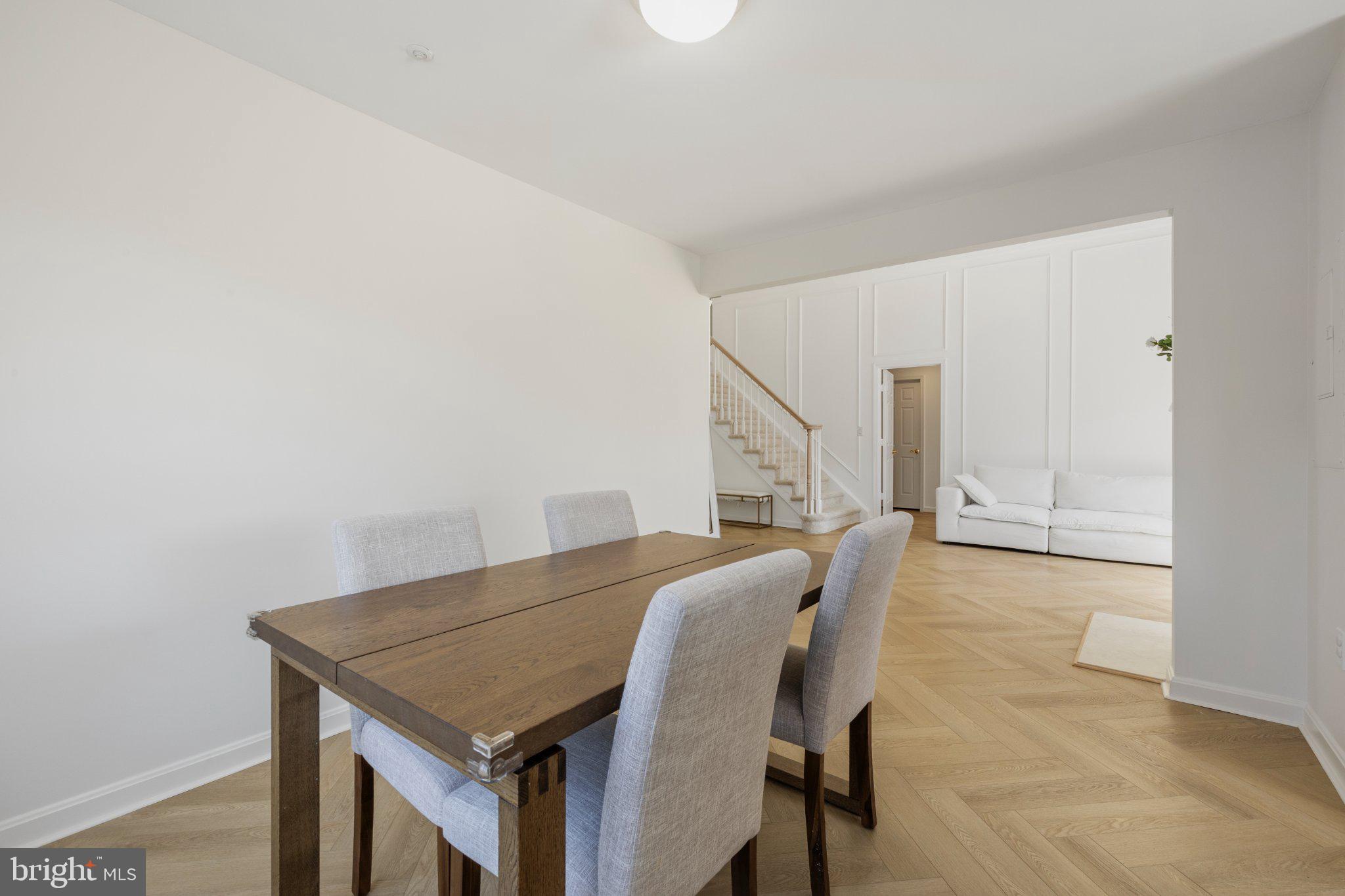 408 Ridgepoint Place, Unit 40838 Gaithersburg, MD 20878 - Photo 8 of 28 Bright and airy dining space awaits.