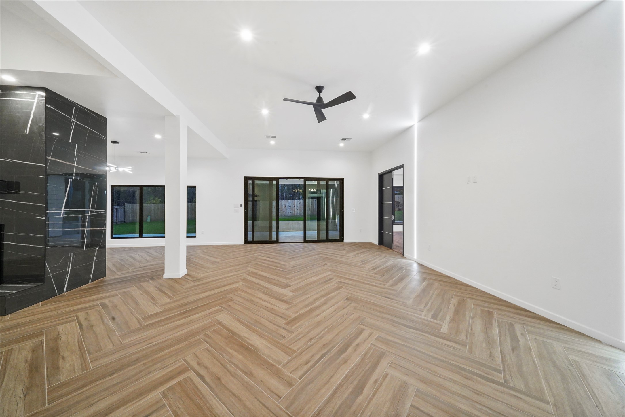 2438 Carriage Lamp Lane Conroe, TX 77384 - Photo 11 of 41 a view of an empty room with a window