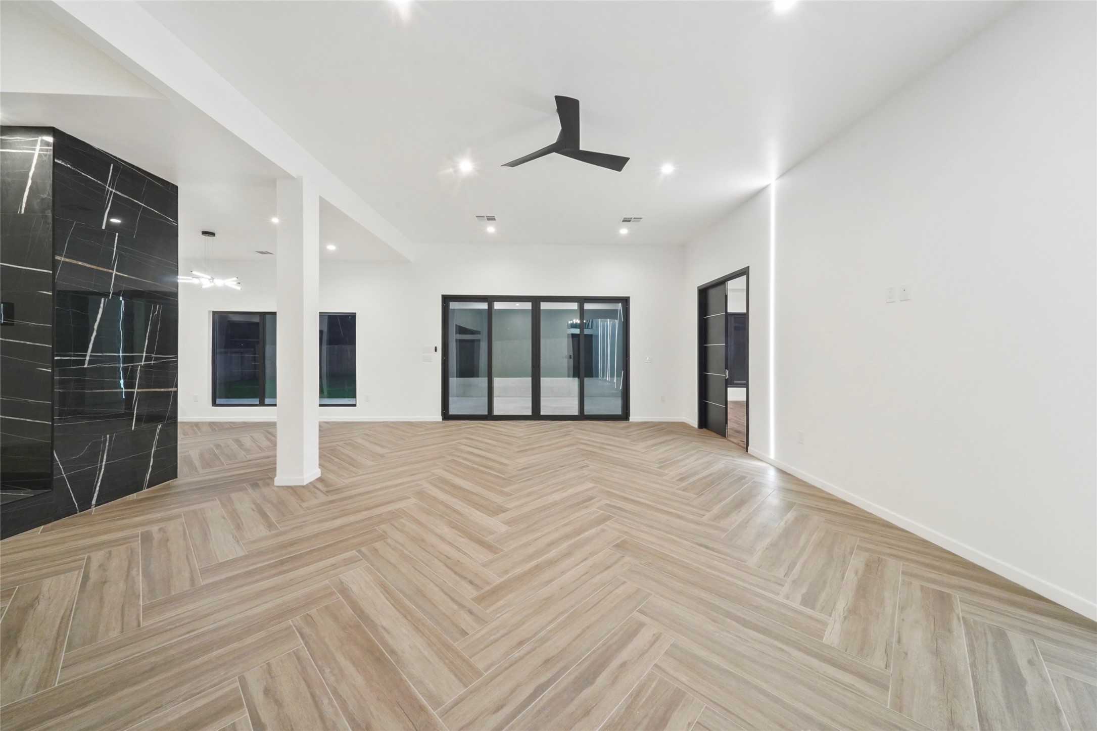 2438 Carriage Lamp Lane Conroe, TX 77384 - Photo 15 of 41 a view of an entryway with wooden floor