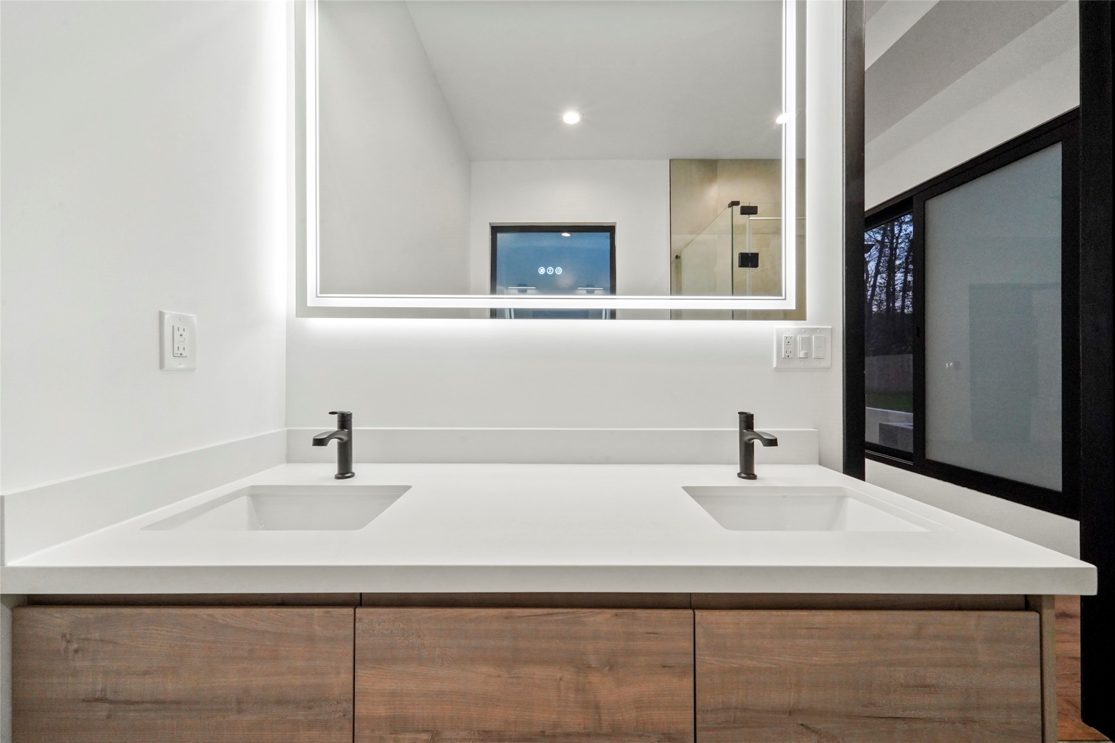 2438 Carriage Lamp Lane Conroe, TX 77384 - Photo 21 of 41 a bathroom with a sink and a mirror