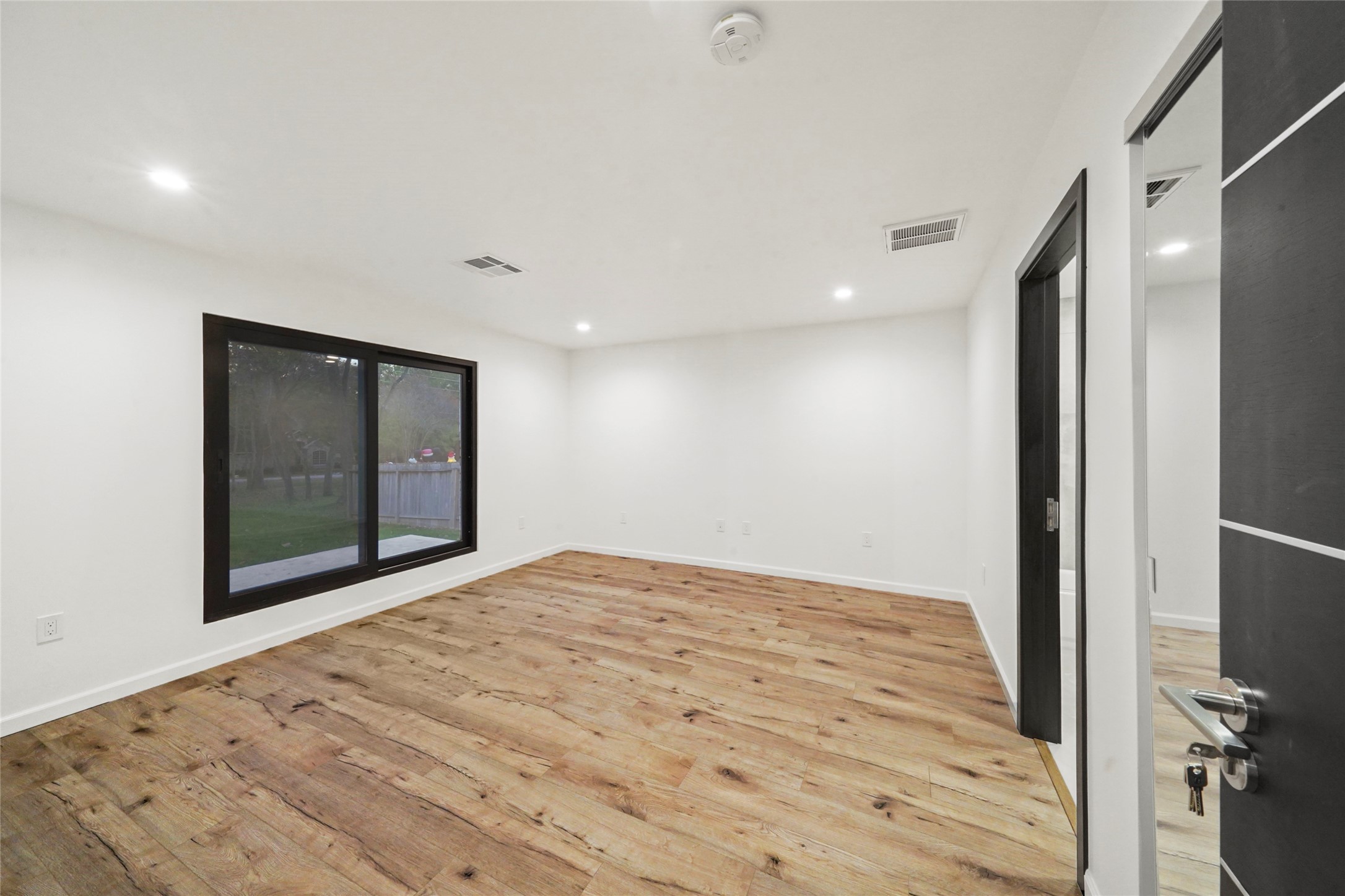 2438 Carriage Lamp Lane Conroe, TX 77384 - Photo 25 of 41 a view of an empty room