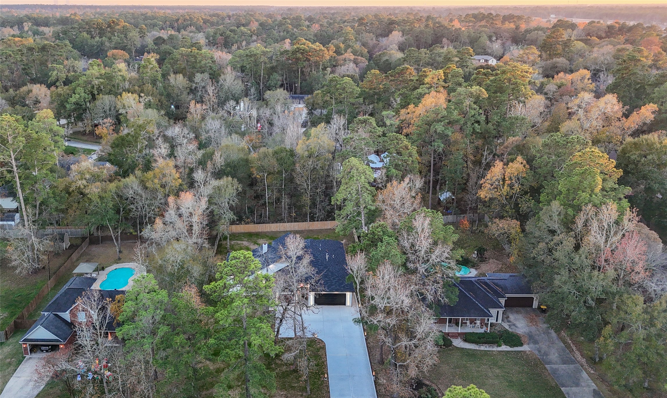 2438 Carriage Lamp Lane Conroe, TX 77384 - Photo 40 of 41 an aerial view of a house with a yard