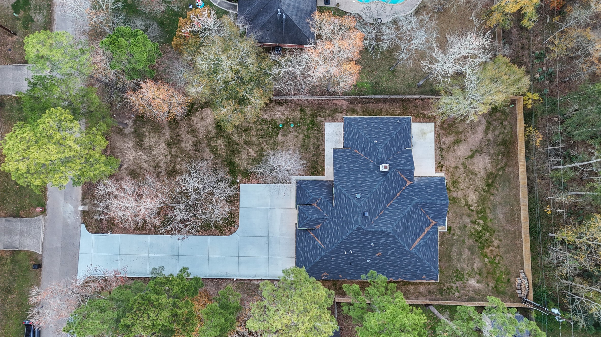 2438 Carriage Lamp Lane Conroe, TX 77384 - Photo 41 of 41 an aerial view of house with outdoor space