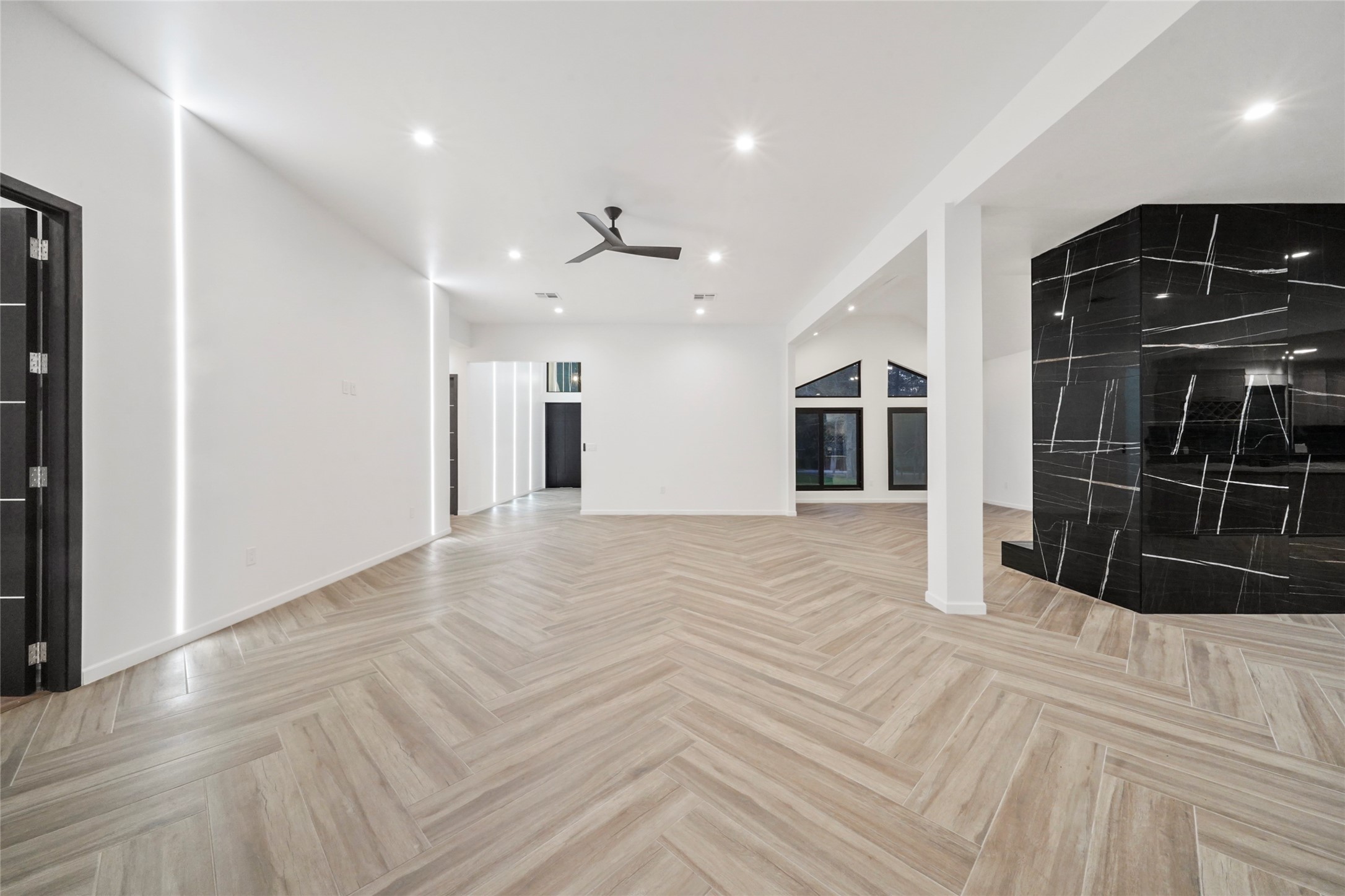 2438 Carriage Lamp Lane Conroe, TX 77384 - Photo 6 of 41 a view of empty room with wooden floor