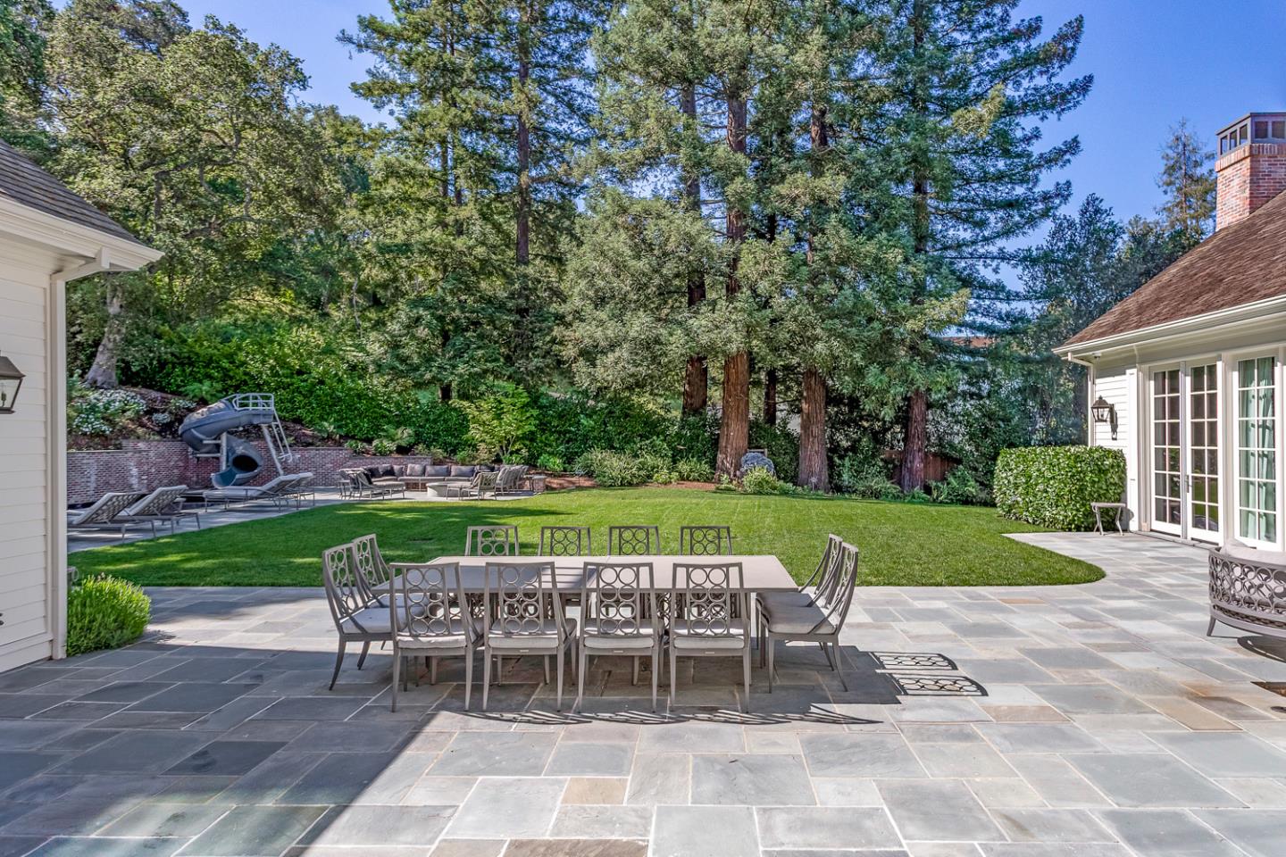 351 Walsh Road Atherton, CA 94027 - Photo 46 of 65 a view of a chairs and table in backyard of the house