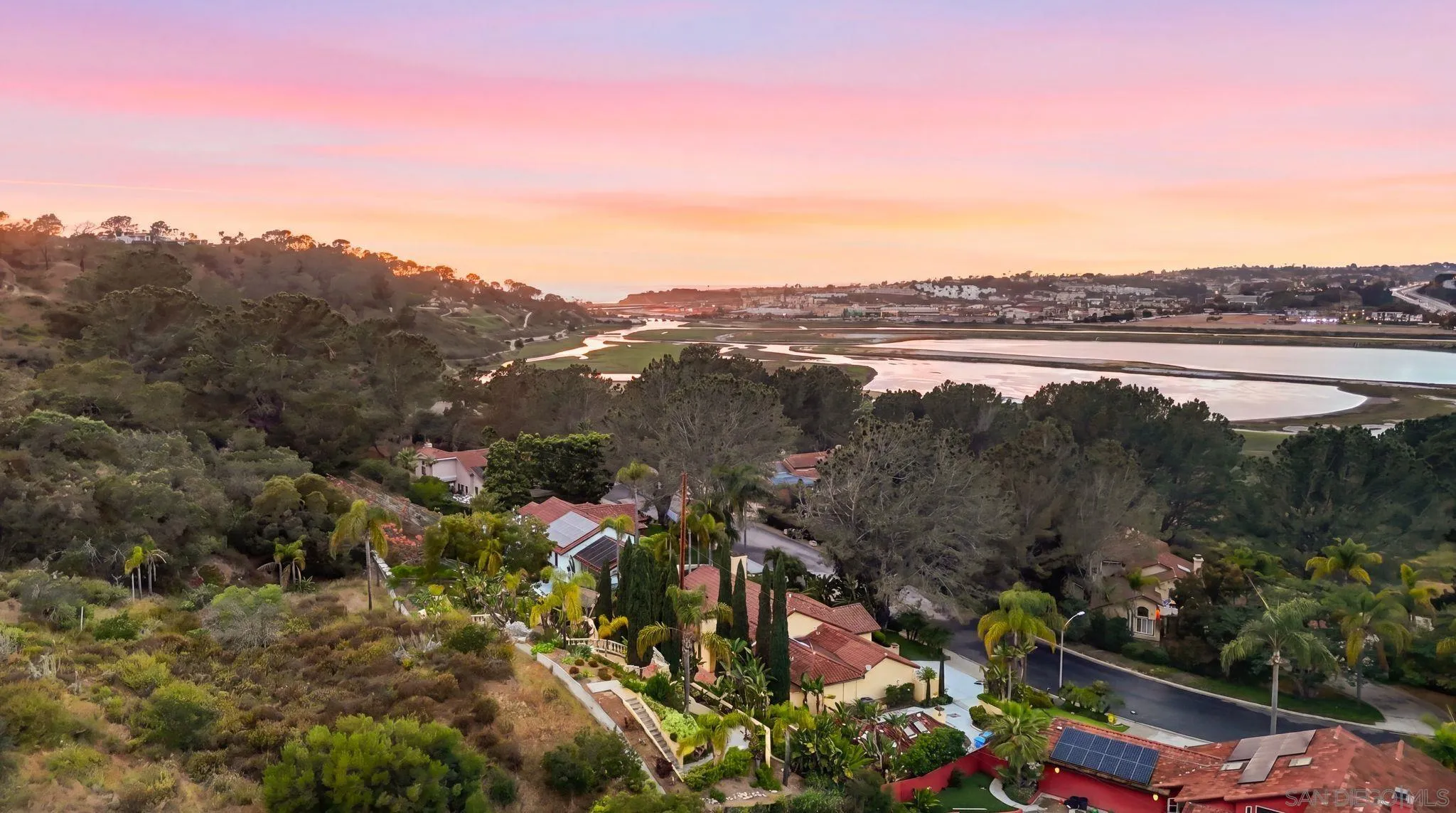 2969 Racetrack View Drive Del Mar, CA 92014 - Photo 3 of 59 a view of a lake with a mountain in the background