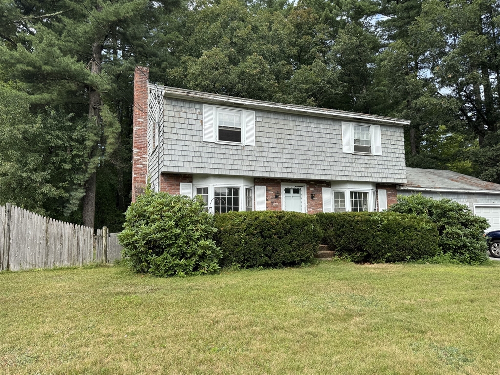 9 Edgewood Avenue Merrimack, NH 03054 - Photo 2 of 13 a front view of house with yard and green space