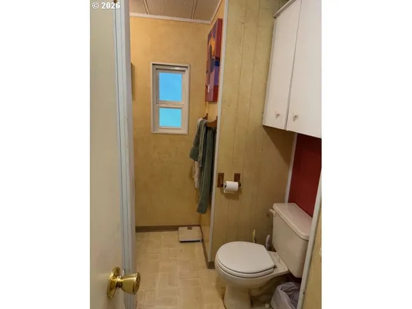 a bed room with a bed and a desk