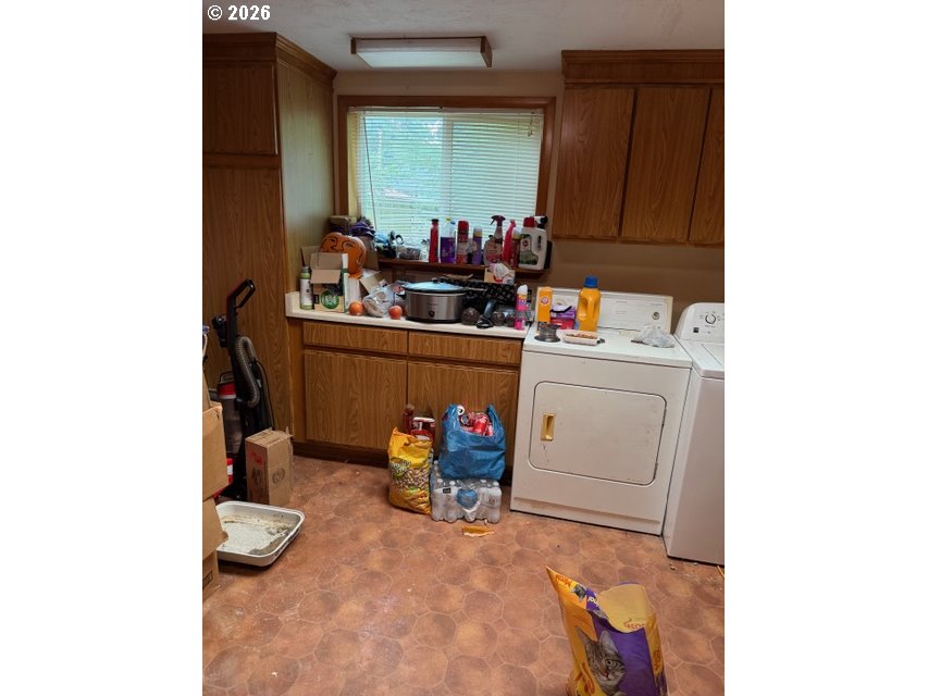 64294 Penny Road Coos Bay, OR 97420 - Photo 21 of 26 a room with storage and utility