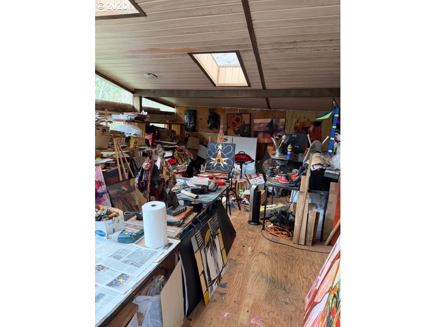 64294 Penny Road Coos Bay, OR 97420 - Photo 23 of 26 a view of a storage room with a lot of stuff
