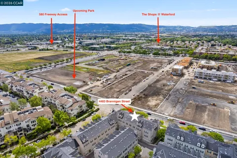 a view of a city with tall buildings