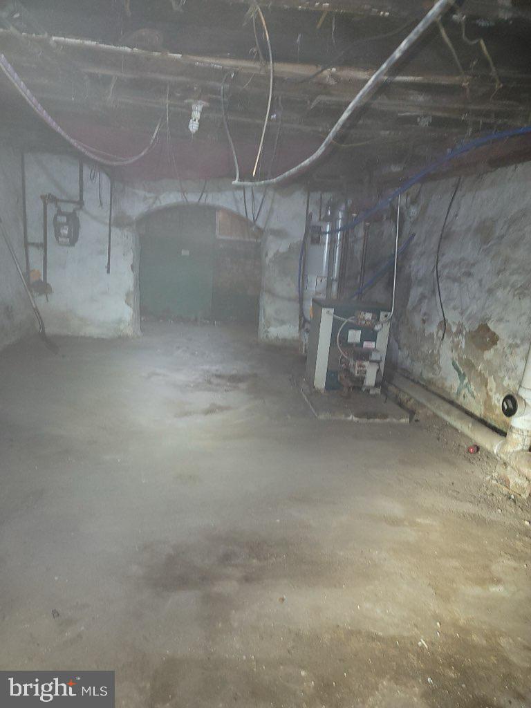2238 Pierce Street Philadelphia, PA 19145 - Photo 6 of 9 a view of a room with racks on the wall