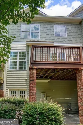 a view of a house with a roof deck