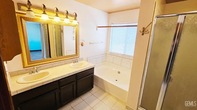 a view of a swimming pool with a patio and couches