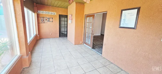 a view of a swimming pool with a patio