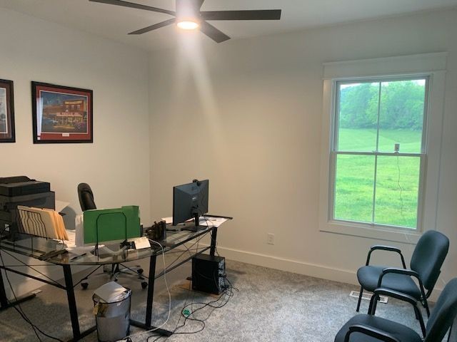 1141 Rogues Fork Road Bethpage, TN 37022 - Photo 54 of 55 a view of a workspace with furniture and a window