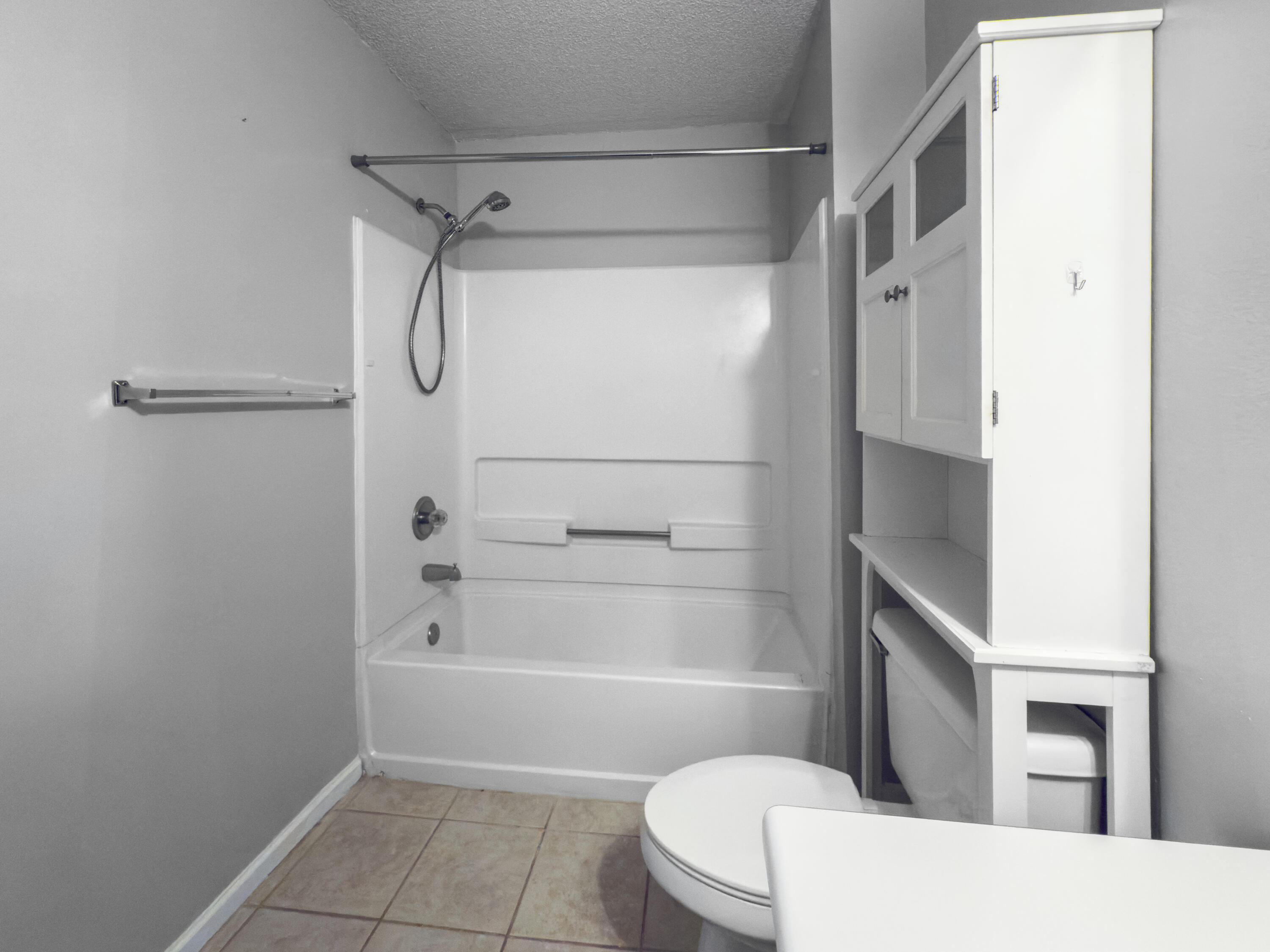 4009 Dancing Cloud Court, Unit 28 Destin, FL 32541 - Photo 19 of 25 a bathroom with a shower a toilet and a shower