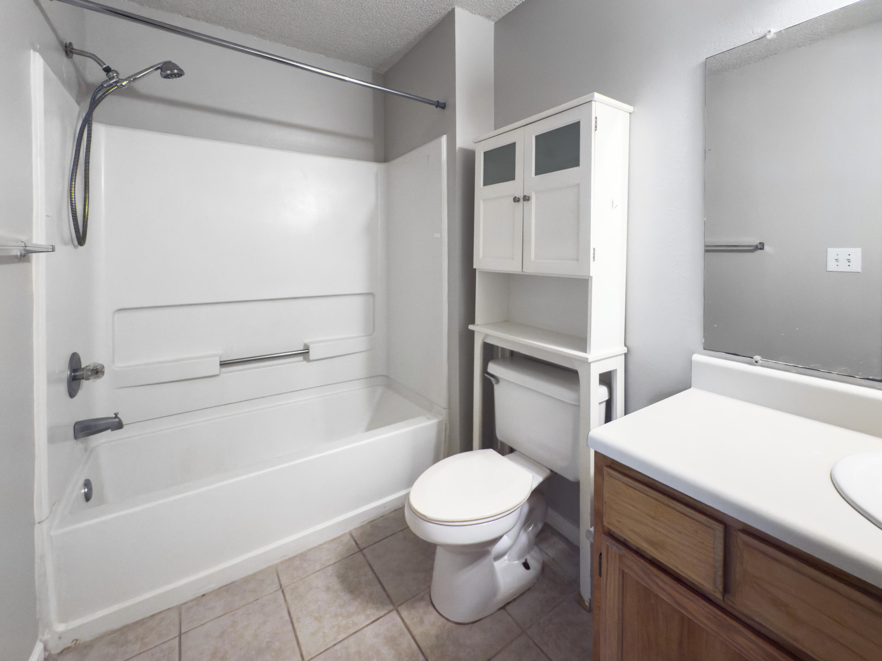 4009 Dancing Cloud Court, Unit 28 Destin, FL 32541 - Photo 20 of 25 a bathroom with a sink a toilet and shower