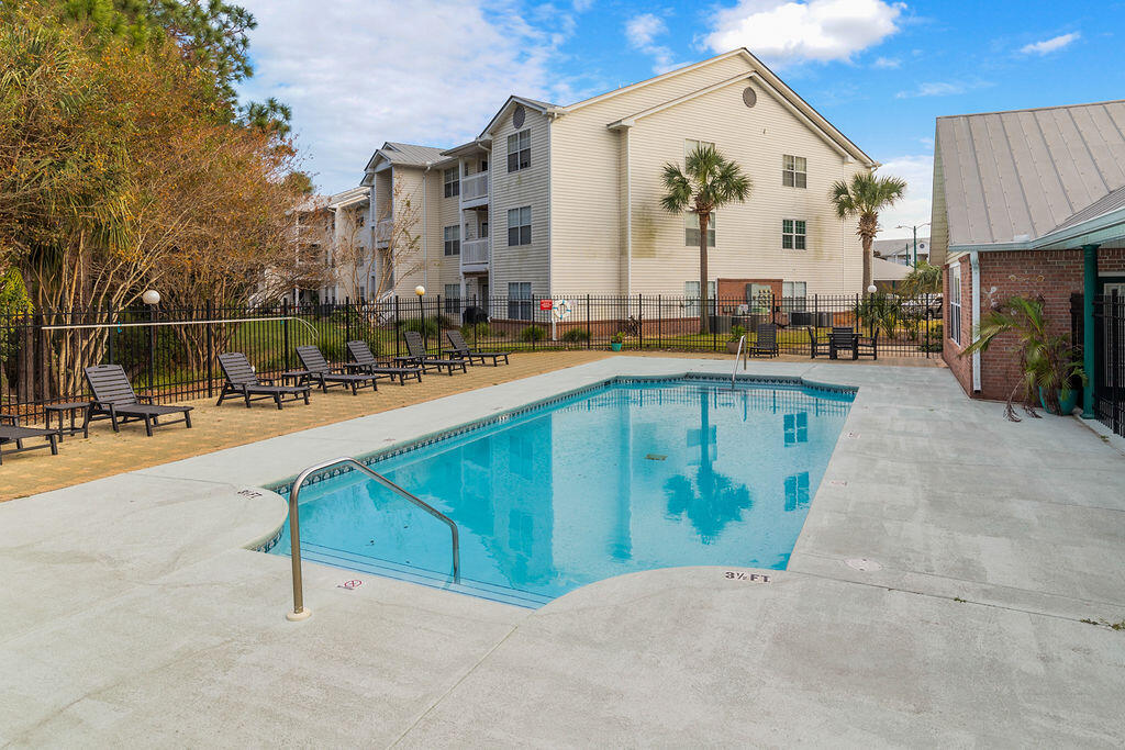 4009 Dancing Cloud Court, Unit 28 Destin, FL 32541 - Photo 2 of 25 a view of a swimming pool with outdoor seating