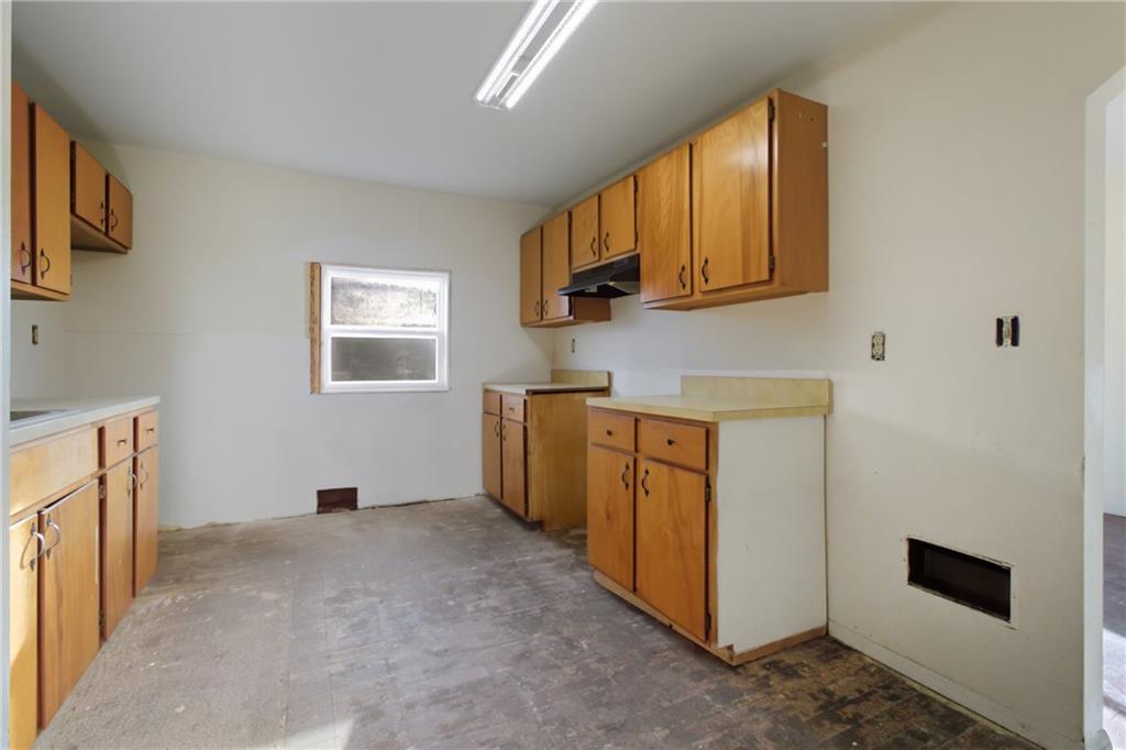 399 Cherry Street Cherry Tree, PA 15724 - Photo 17 of 24 a utility room with cabinets washer and dryer