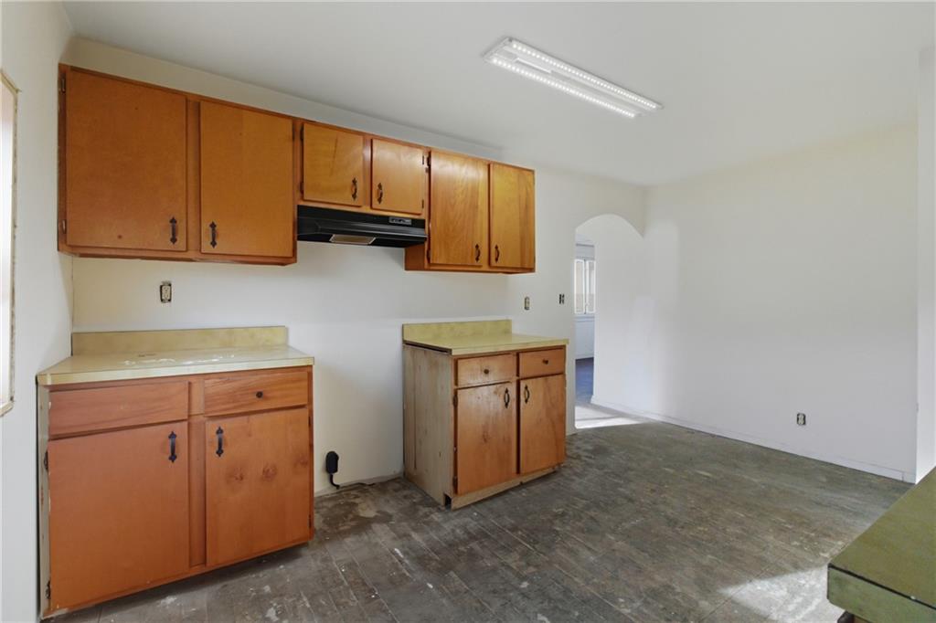 399 Cherry Street Cherry Tree, PA 15724 - Photo 19 of 24 a kitchen with a sink cabinets and a window