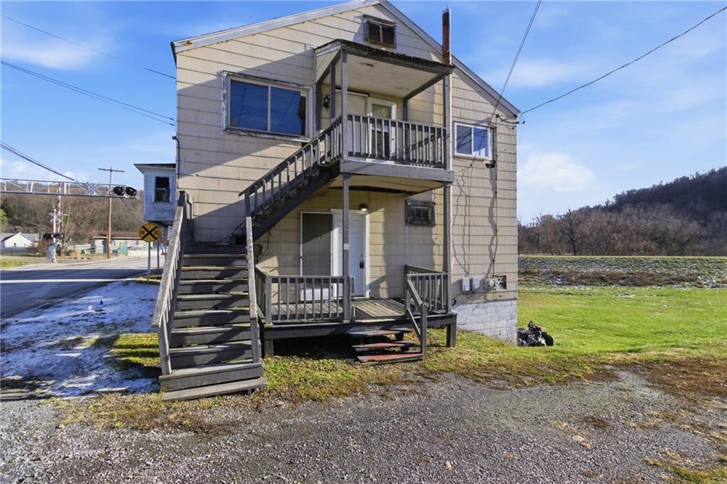 399 Cherry Street Cherry Tree, PA 15724 - Photo 4 of 24 a view of a house with a yard