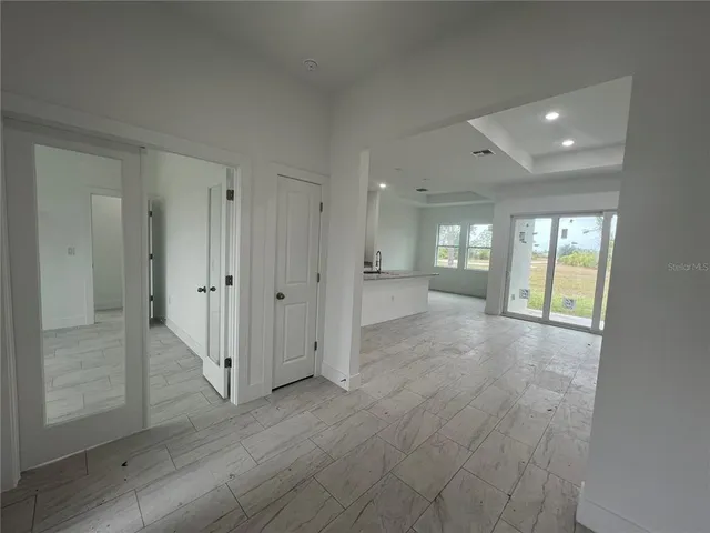 a view of entryway with wooden floor