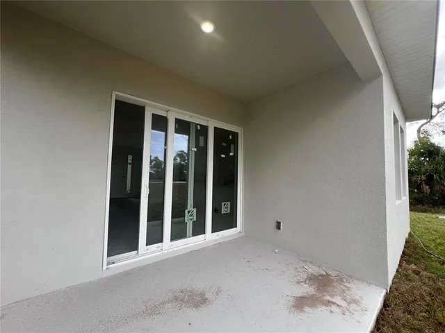 a view of a big room with windows