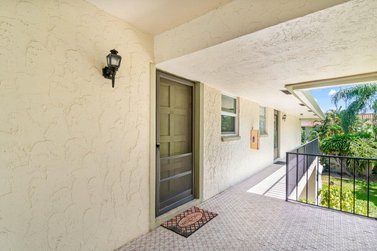 1124 Northwest 13th Street, Unit 204A Boca Raton, FL 33486 - Photo 24 of 30 a view of entryway with interior