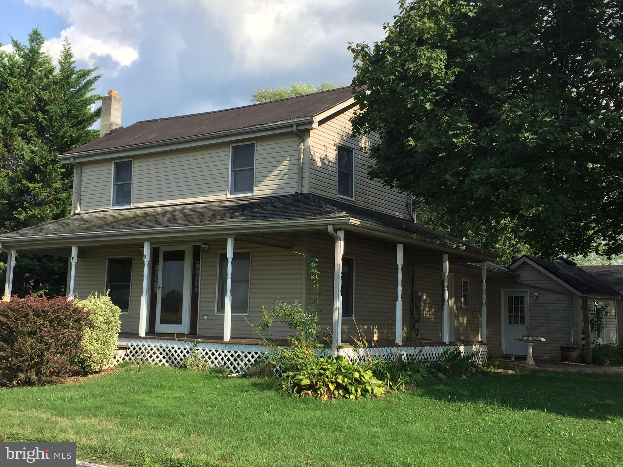 5843 Conover Road Taneytown, MD 21787 - Photo 1 of 11 Front & wrap around porch
