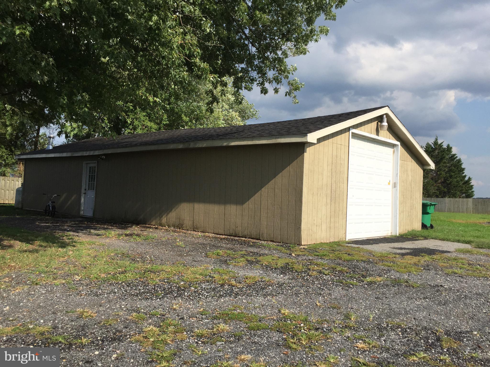 5843 Conover Road Taneytown, MD 21787 - Photo 3 of 11 Detached heated garage w/ storage in rear of bldg