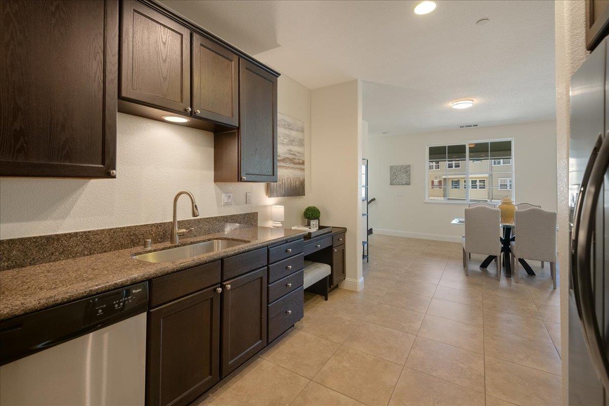 635 True Wind Way, Unit 515 Redwood City, CA 94063 - Photo 19 of 46 a kitchen with sink cabinets and stove